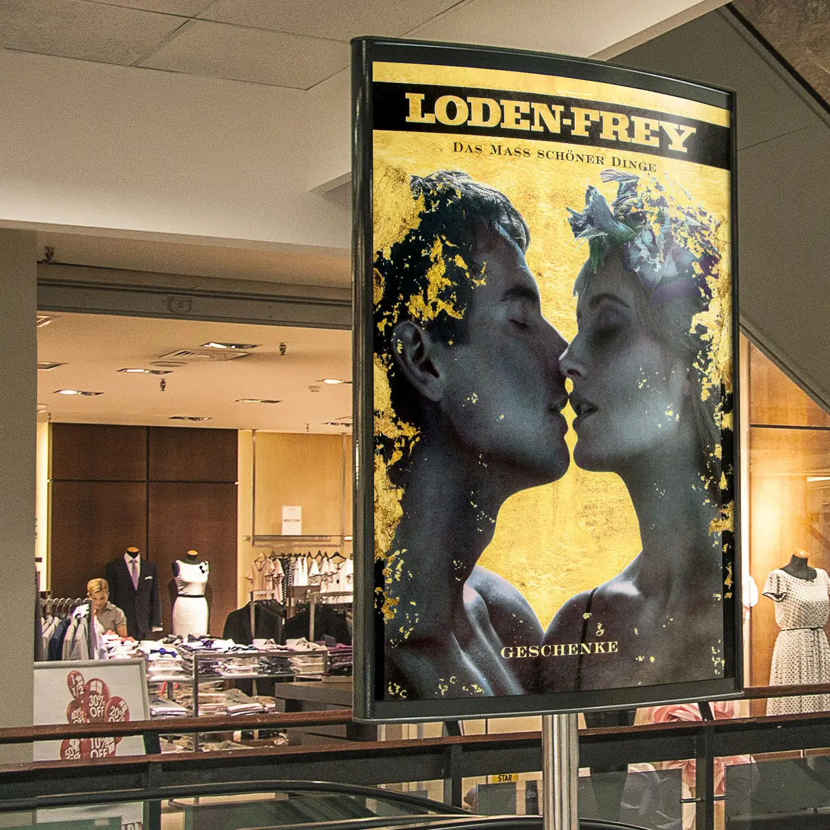 LODEN-FREY – beleuchtetes Plakat »Das Maß schöner Dinge«.